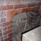 A fireplace revealed in the Infants School.